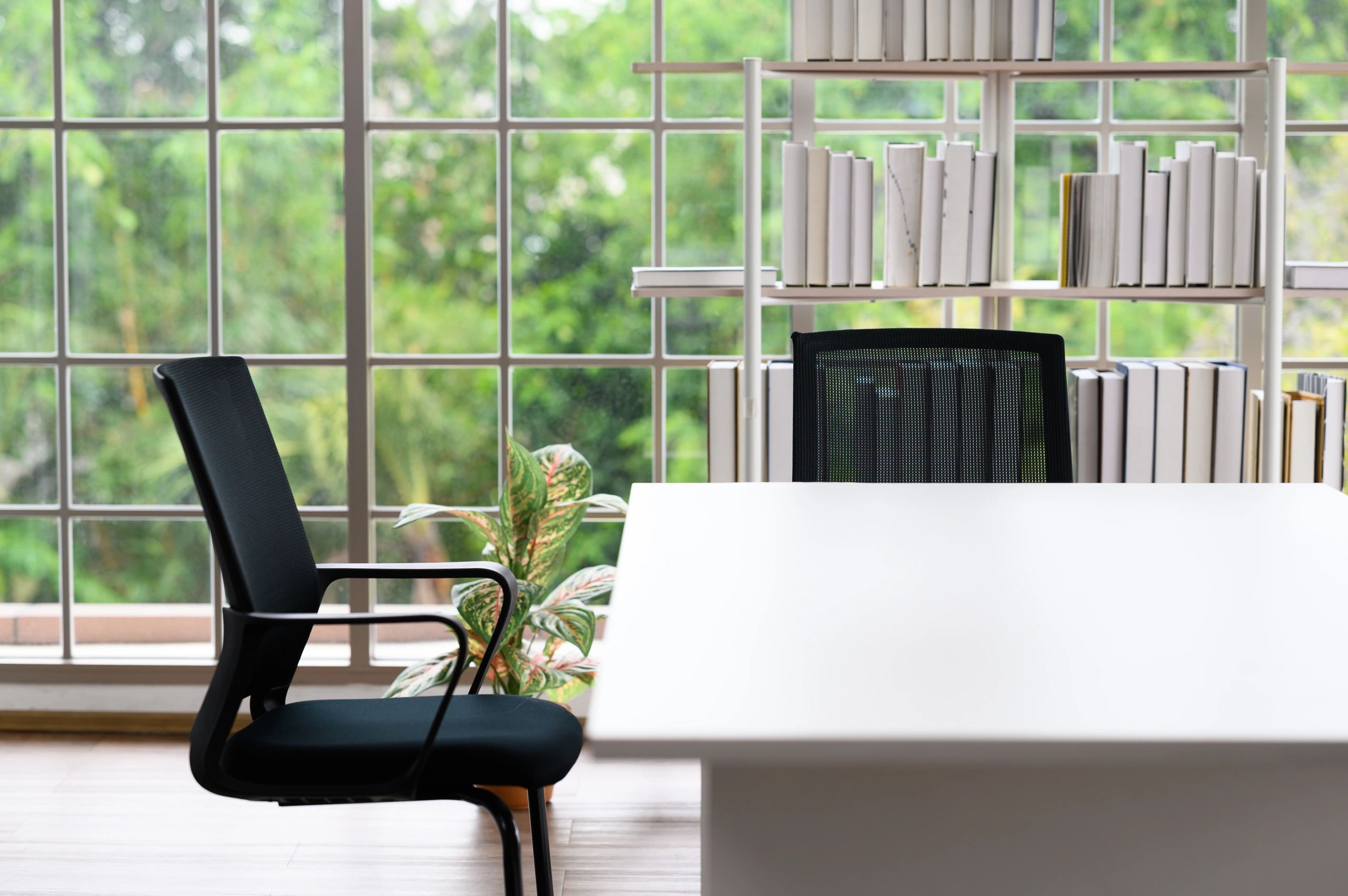Calm home workspace with desk and window view