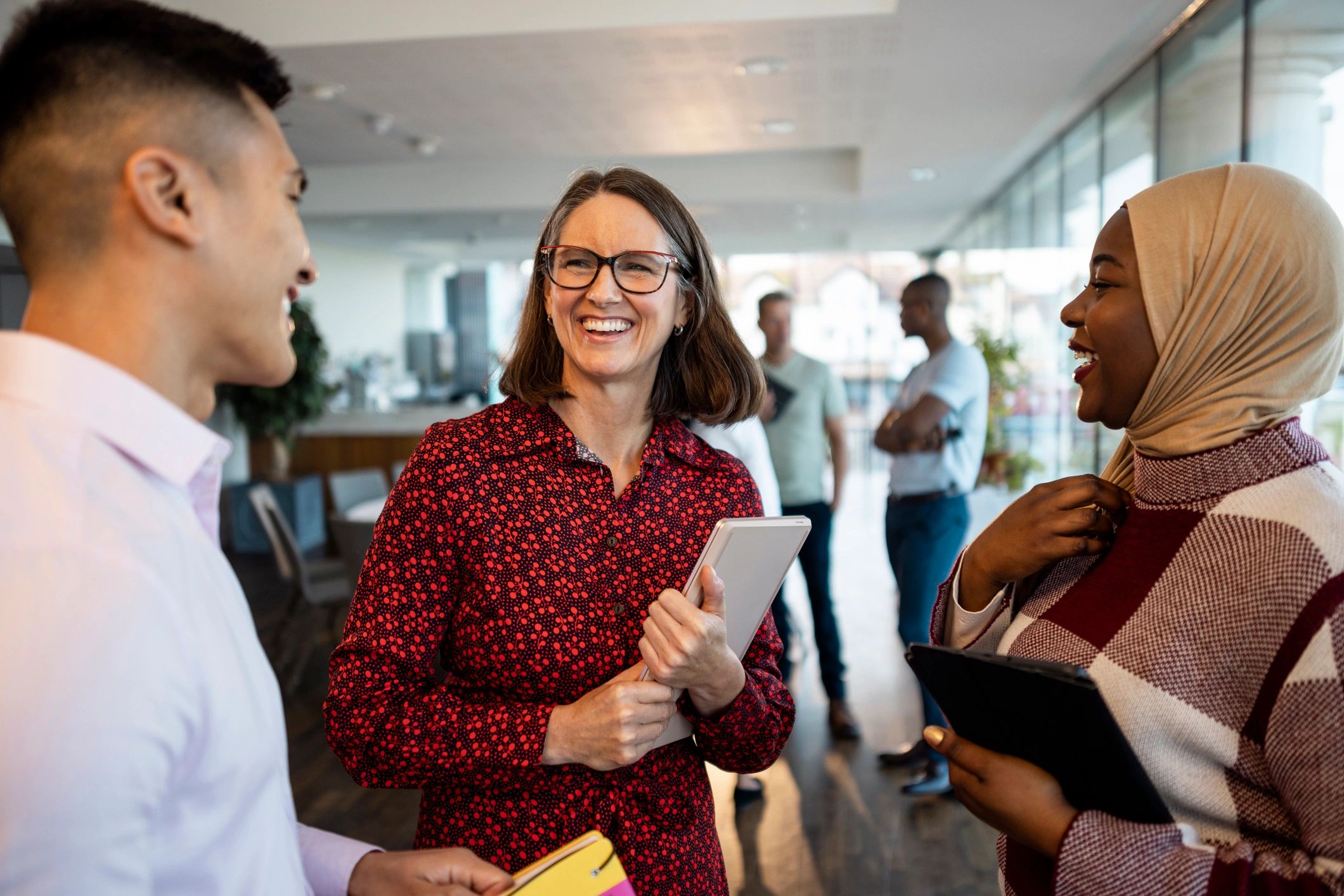 Professionals in a workplace support discussion